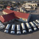 An aerial photo of Bryan's Fuel, their buildings and their fleet of service and delivery trucks.