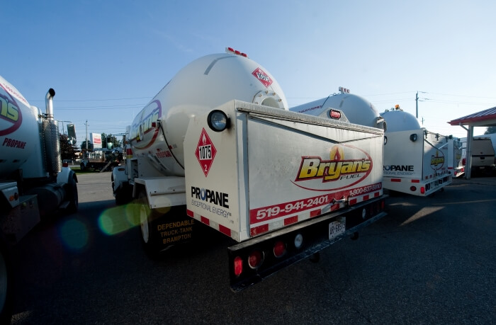 A photo the back of a Bryan's Fuel propane truck in a parking lot.