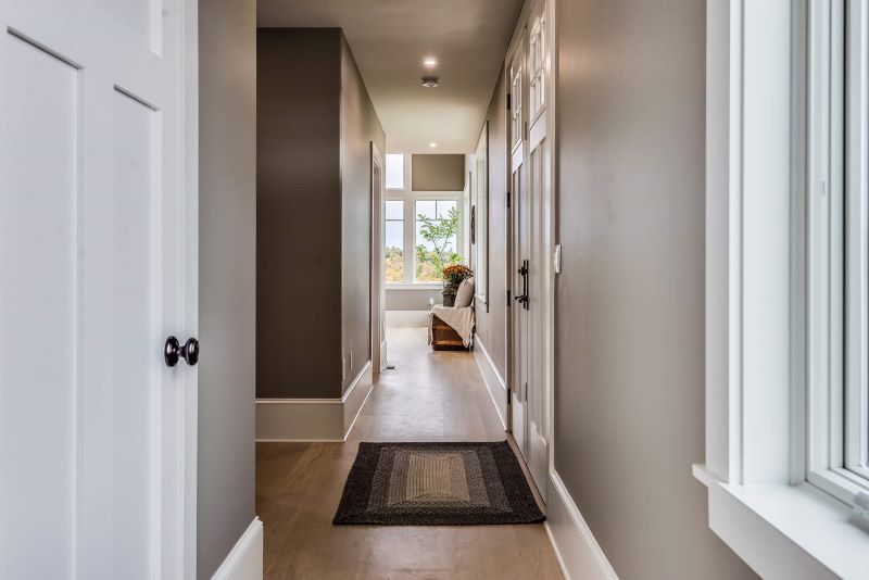 A photo of a hallway in a home.