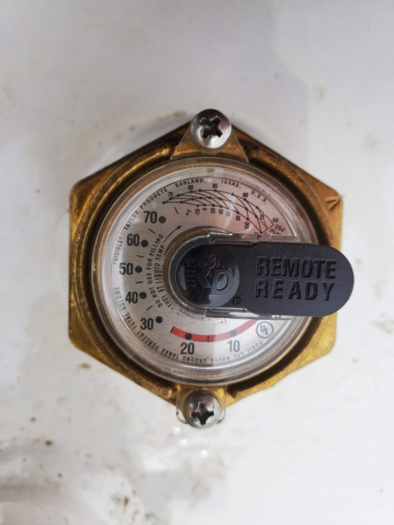 A close-up photo of a fuel gauge.
