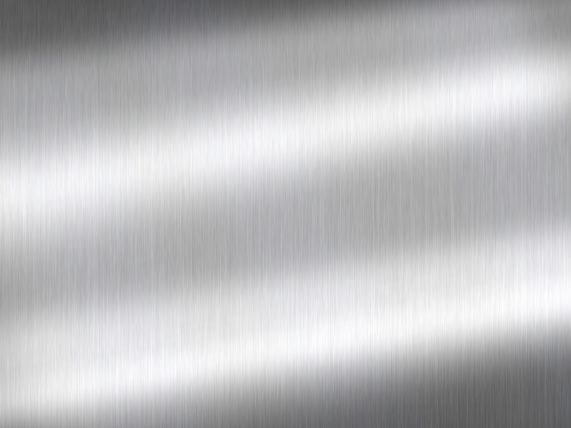 The image shows a close-up of brushed metal with a smooth, reflective surface and parallel lines running horizontally across it.