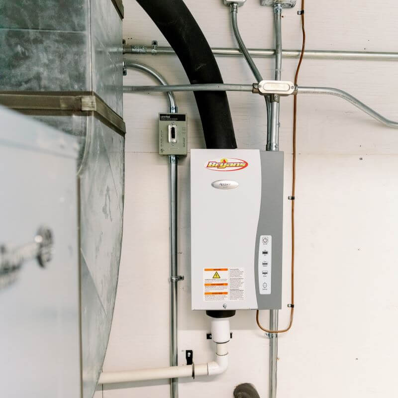 A photo of a whole-home humidifier installed by Bryan's Fuel.