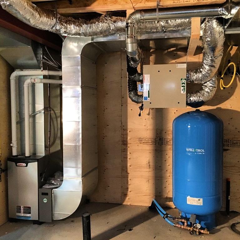 A basement furnace waiting to be serviced