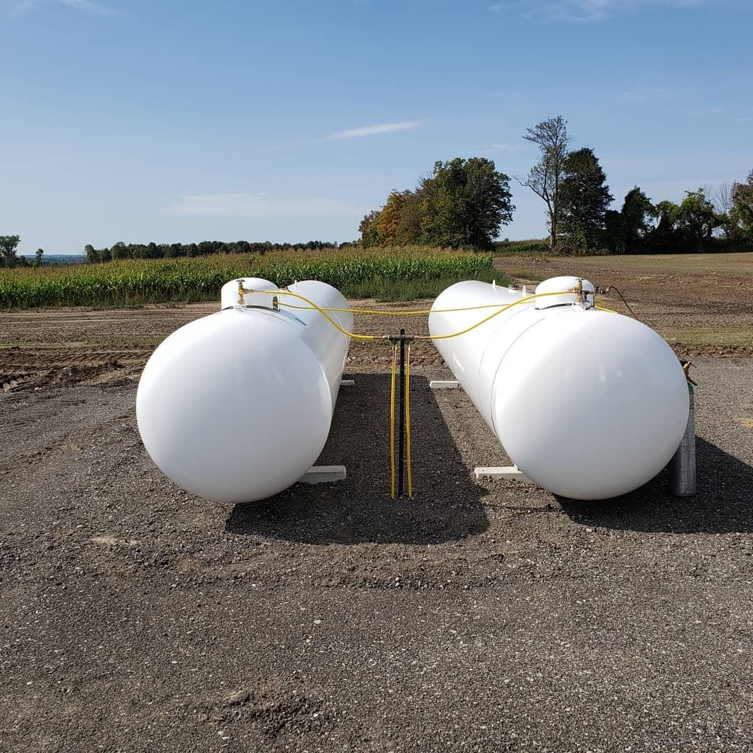 Two propane tanks.