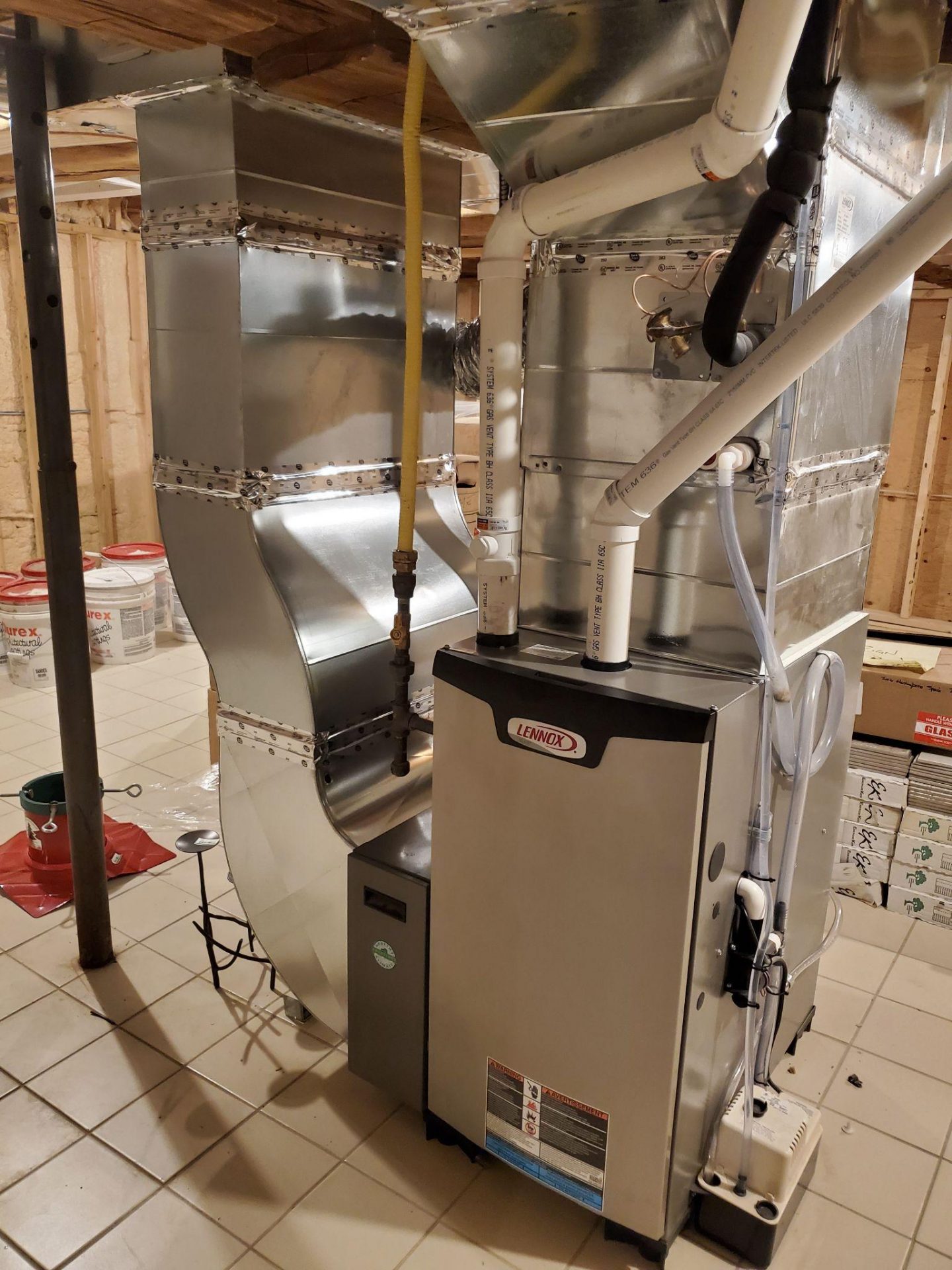 Lennox furnace in a basement.