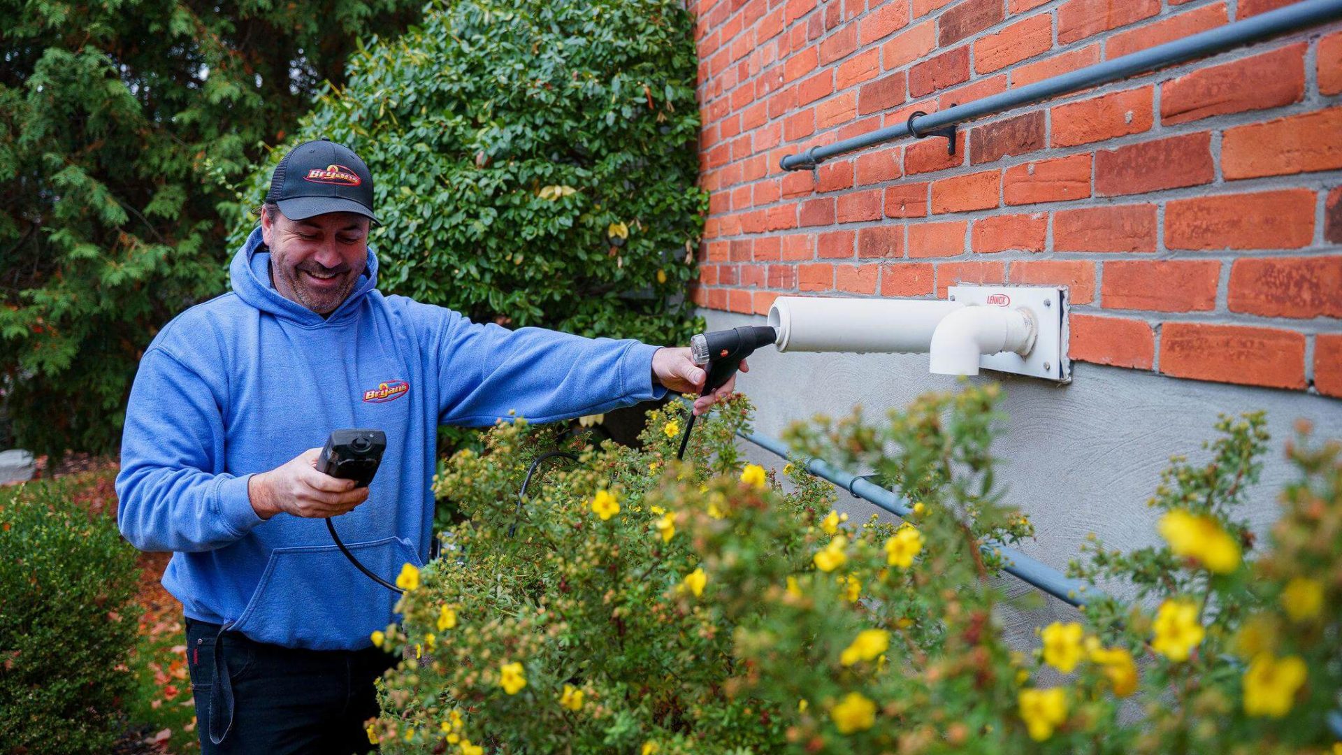 Bryan's Fuel technician checking HVAC unit